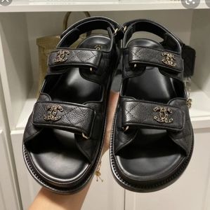 Chanel dad sandals 21C black and gold